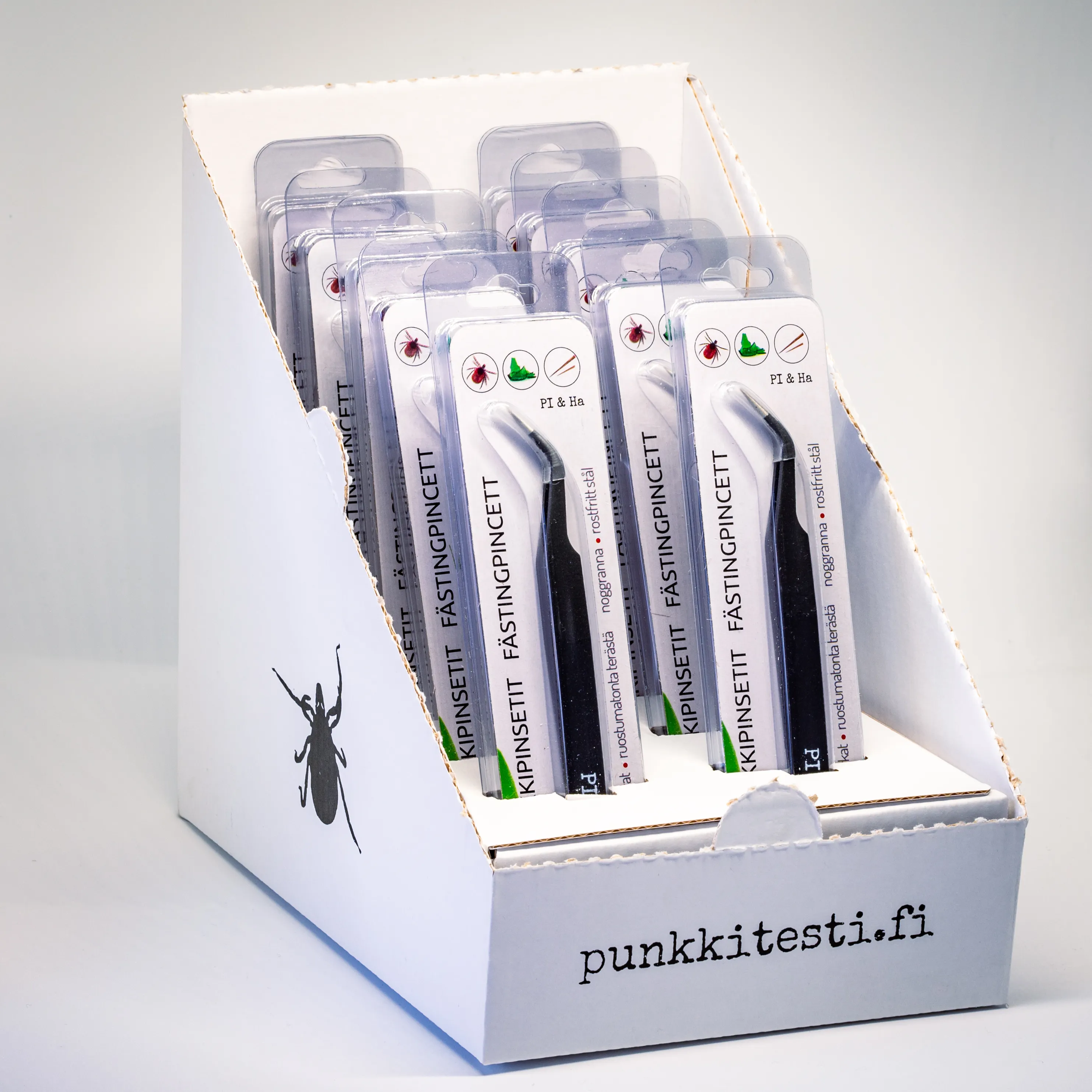 PI & Ha Punkkipinsetit myyntipakkauksessa apteekin hyllyssä.